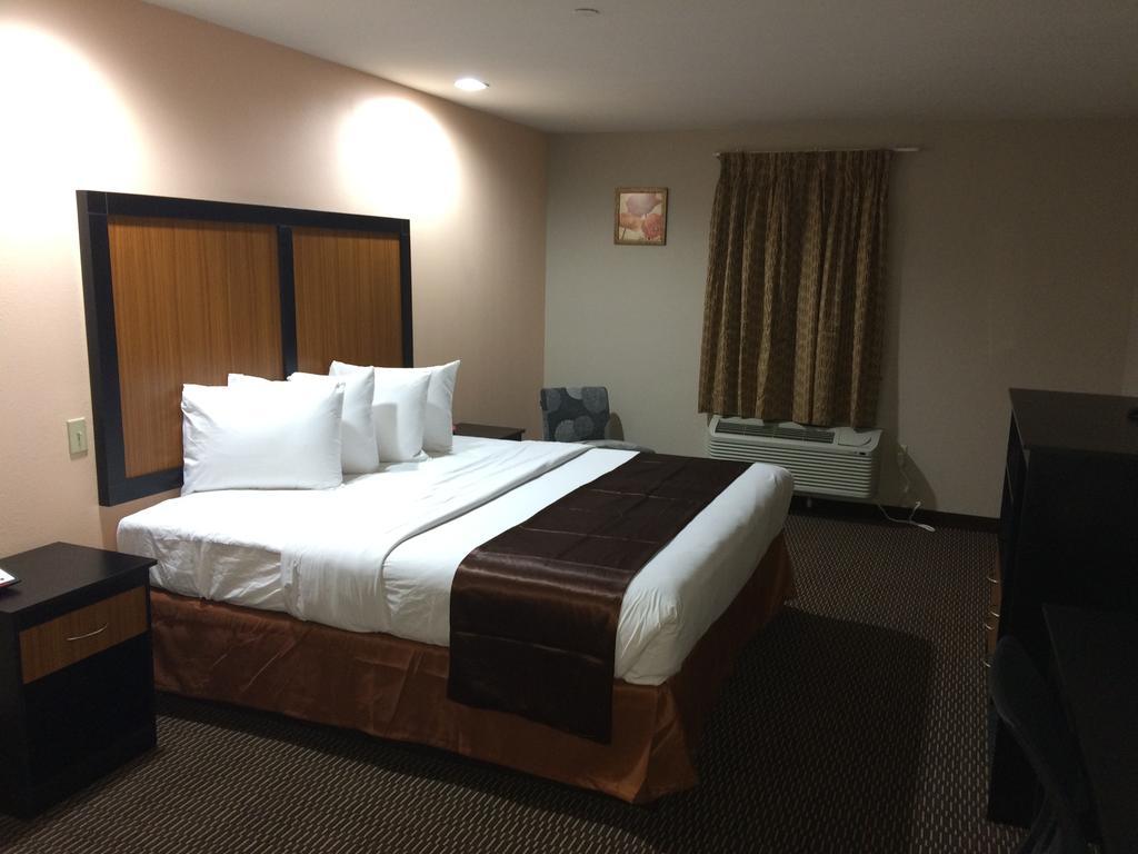 Paradise Inn & Suites Baton Rouge Rum bild